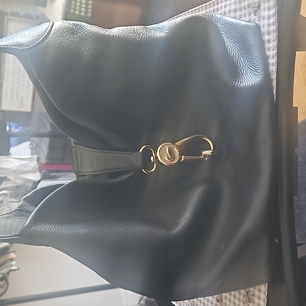 Beautiful all leather Dooney and Burke shoulder bag Offers welcome